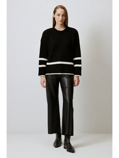 Pull avec boutons dorés
