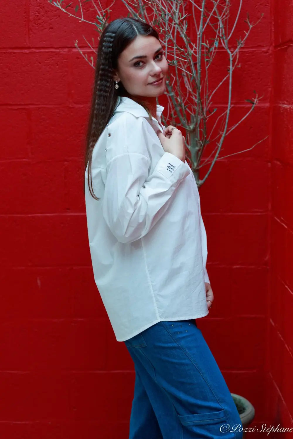Chemisier blanc à rivets et strass