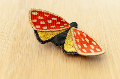 Broche papillon orange-doré